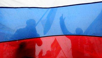 Немцы встретили Меркель российской символикой Немцы встретили Меркель российской символикой