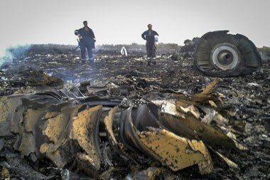 Окончательный доклад о крушении Boeing на Украине выйдет летом 2015 года Окончательный доклад о крушении Boeing на Украине выйдет летом 2015 года