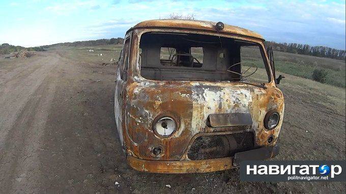 Донецкие ополченцы разбили базу Нацгвардии: Репортаж с места боя (ФОТО) Донецкие ополченцы разбили базу Нацгвардии: Репортаж с места боя (ФОТО)