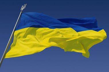 В Славянске сожгли флаг Украины В Славянске сожгли флаг Украины