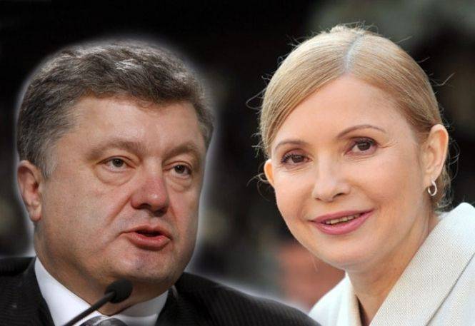Тимошенко обвинила Порошенко в сговоре с Путиным Тимошенко обвинила Порошенко в сговоре с Путиным