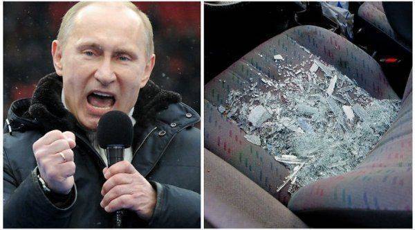 На светофоре в автомобиле разбили ломом стекло. Владелец считает, что из-за наклейки про Путина На светофоре в автомобиле разбили ломом стекло. Владелец считает, что из-за наклейки про Путина