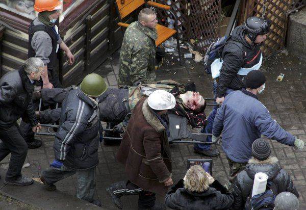 Активист Майдана заявил, что в 2014 году в него стреляли из отеля "Украина" Активист Майдана заявил, что в 2014 году в него стреляли из отеля "Украина"