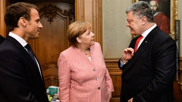 «Странно, что его выслушали»: политолог про переговоры Порошенко, Меркель и Макрона