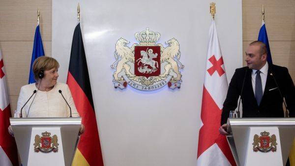 Путин «завербовал» Меркель и послал её в Грузию